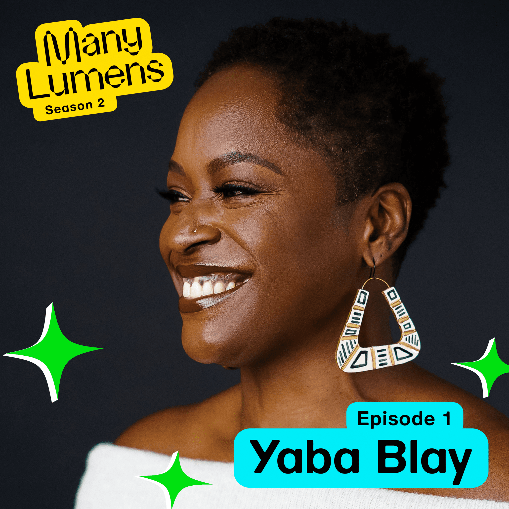 A headshot of Yaba Blay smiling. Yaba is wearing a white off-the-shoulder top and chunky earrings. The Many Lumens logo is in the top left corner, her name is is in the bottom right.