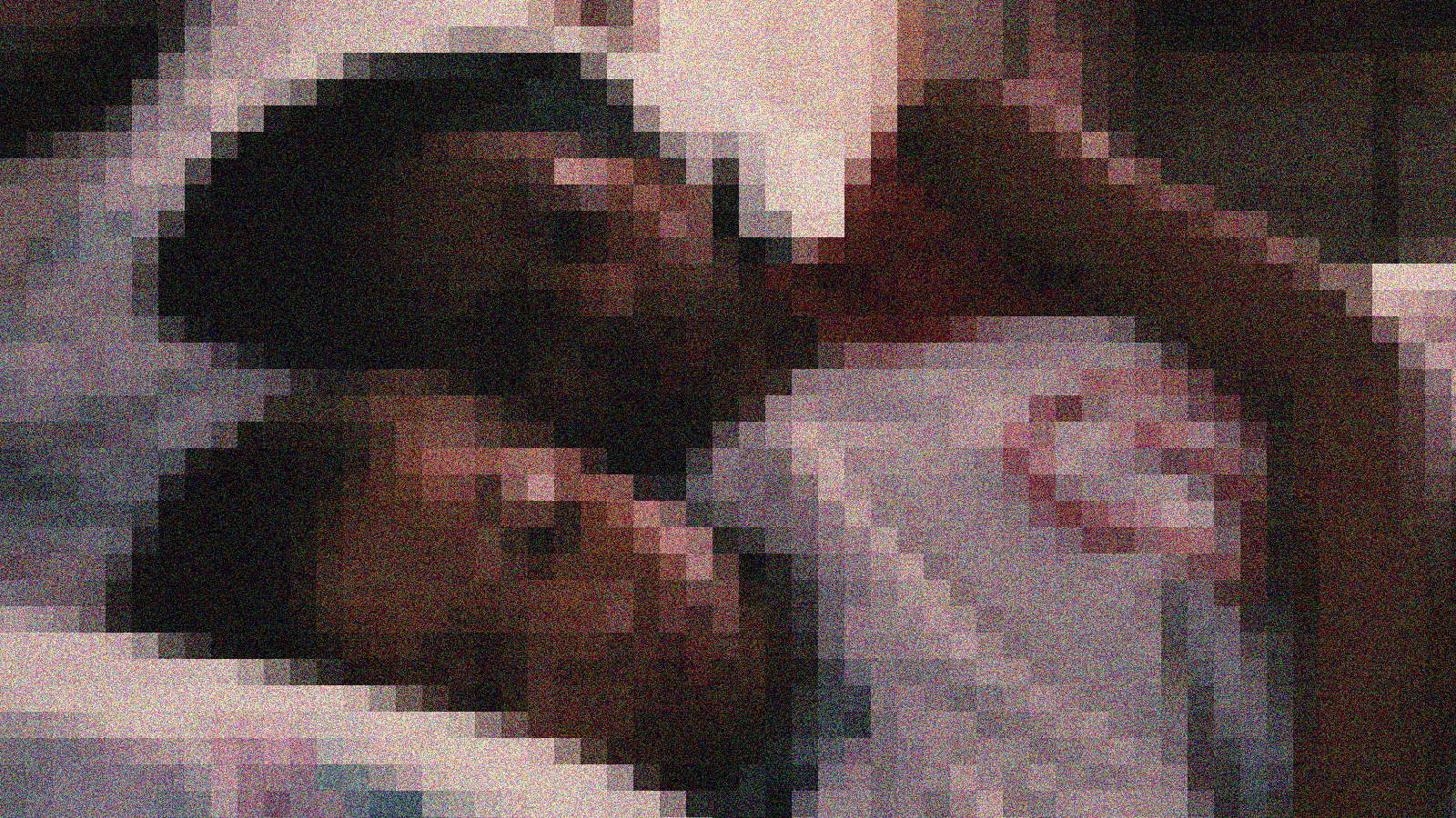 a color image from Eve’s Bayou of a young woman asleep in bed with her older sister, who's awake. Her eyes are open.