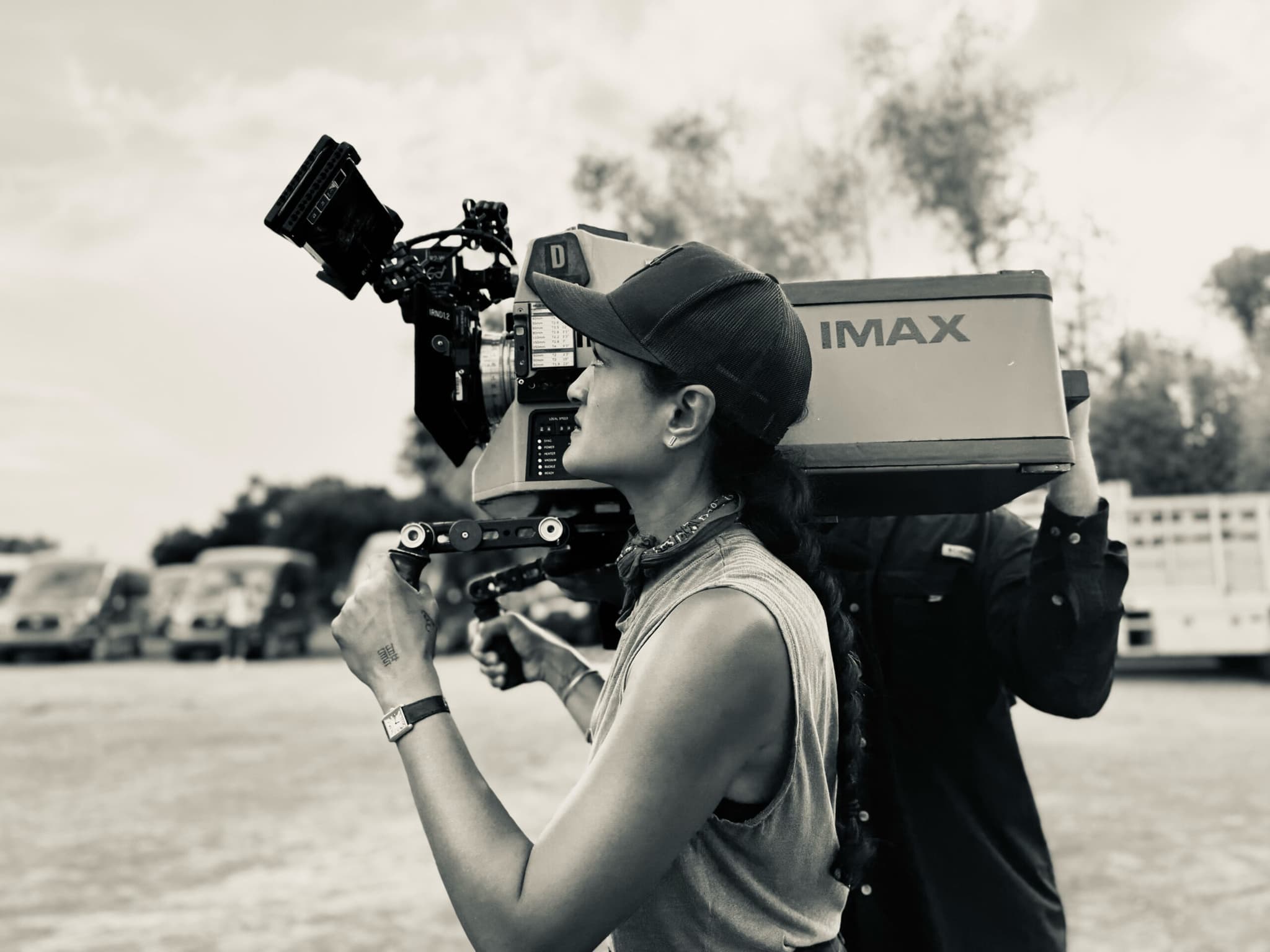 Autumn Durald Arkapaw is holding a film camera.