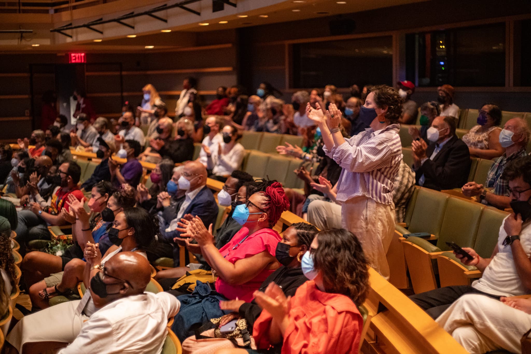 A photo from BlackStar Film Festival of a crowd of people applauding.