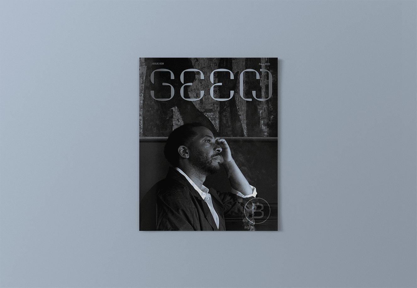The cover of Seen 009 featuring actor André Holland against a blue-gray backround.