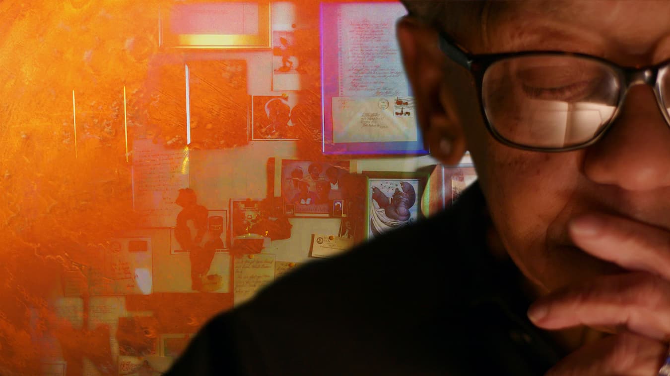 A color collage of Nikki Giovanni. An elder Black woman shown in partial close up, wearing glasses with her hand resting on her chin/lips. She is positioned against an abstract bright orange background.