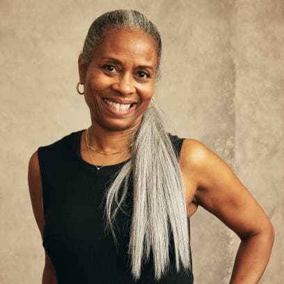 A photograph shows a portrait of Luchina Fisher.