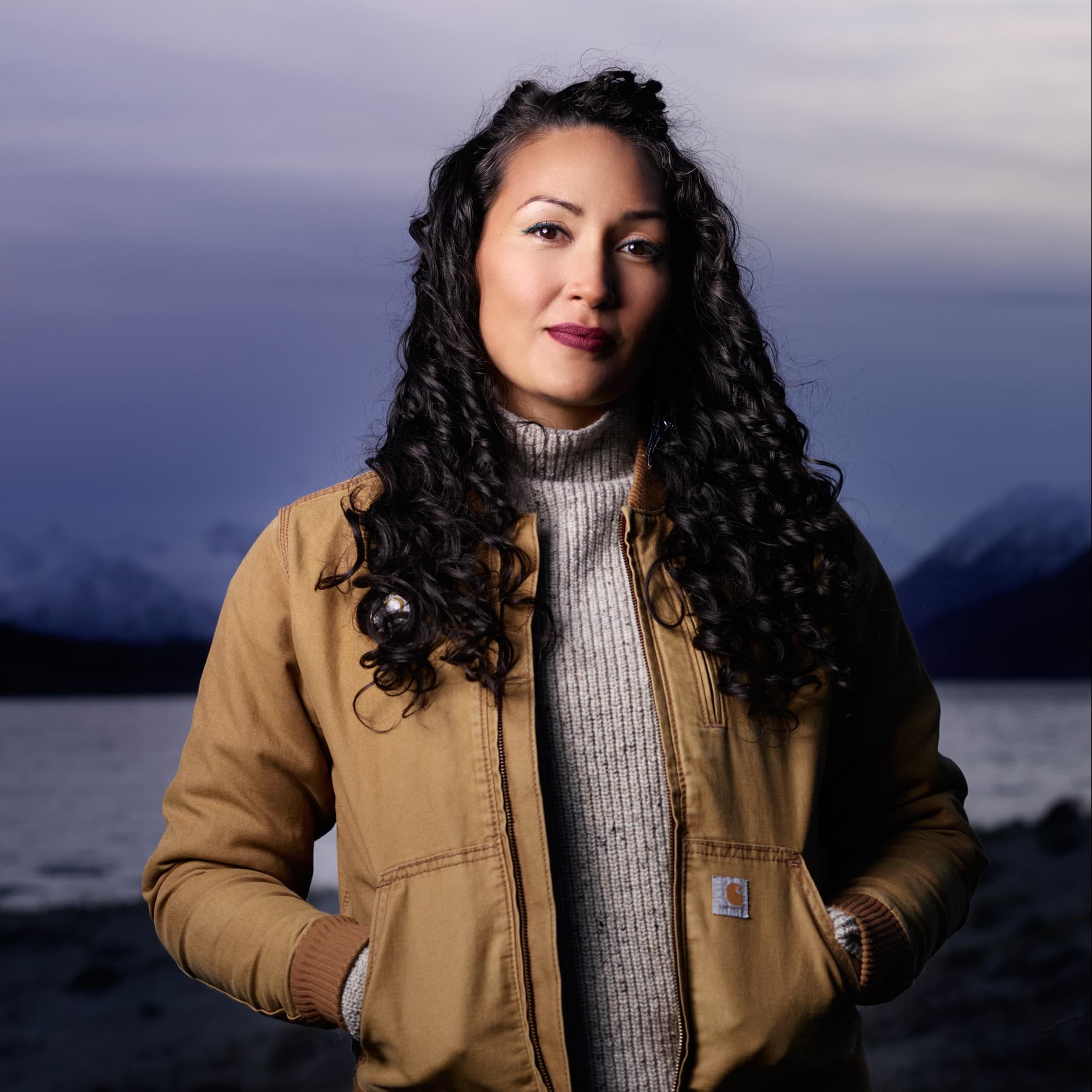 A photograph shows a portrait of Siku Allooloo.