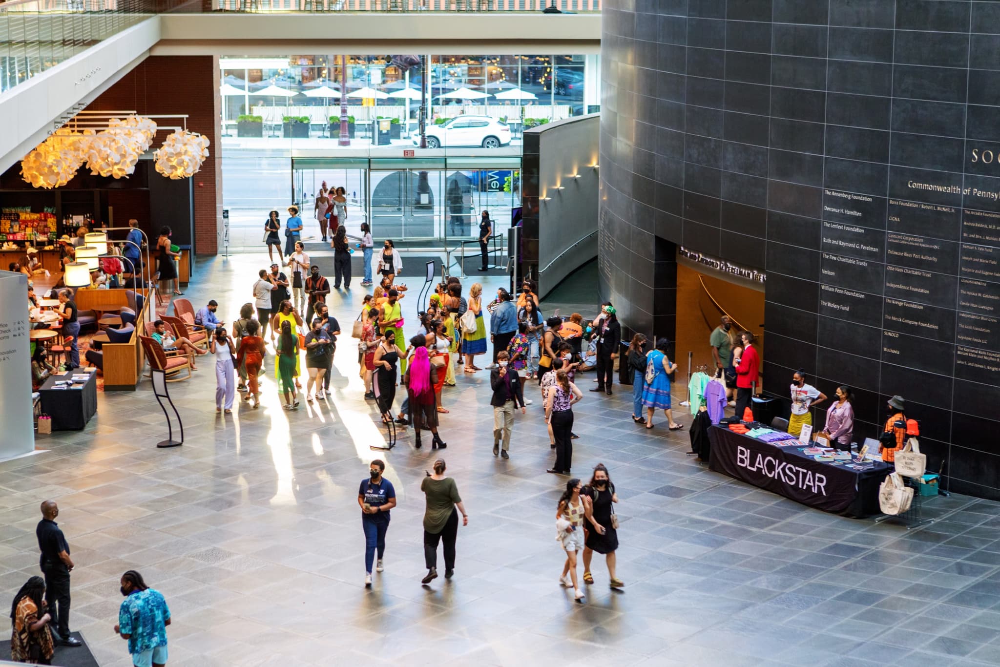 A photo of the lobby inside the Kimmel Center in Philadelphia shows a banner for BlackStar and a crowd of people
