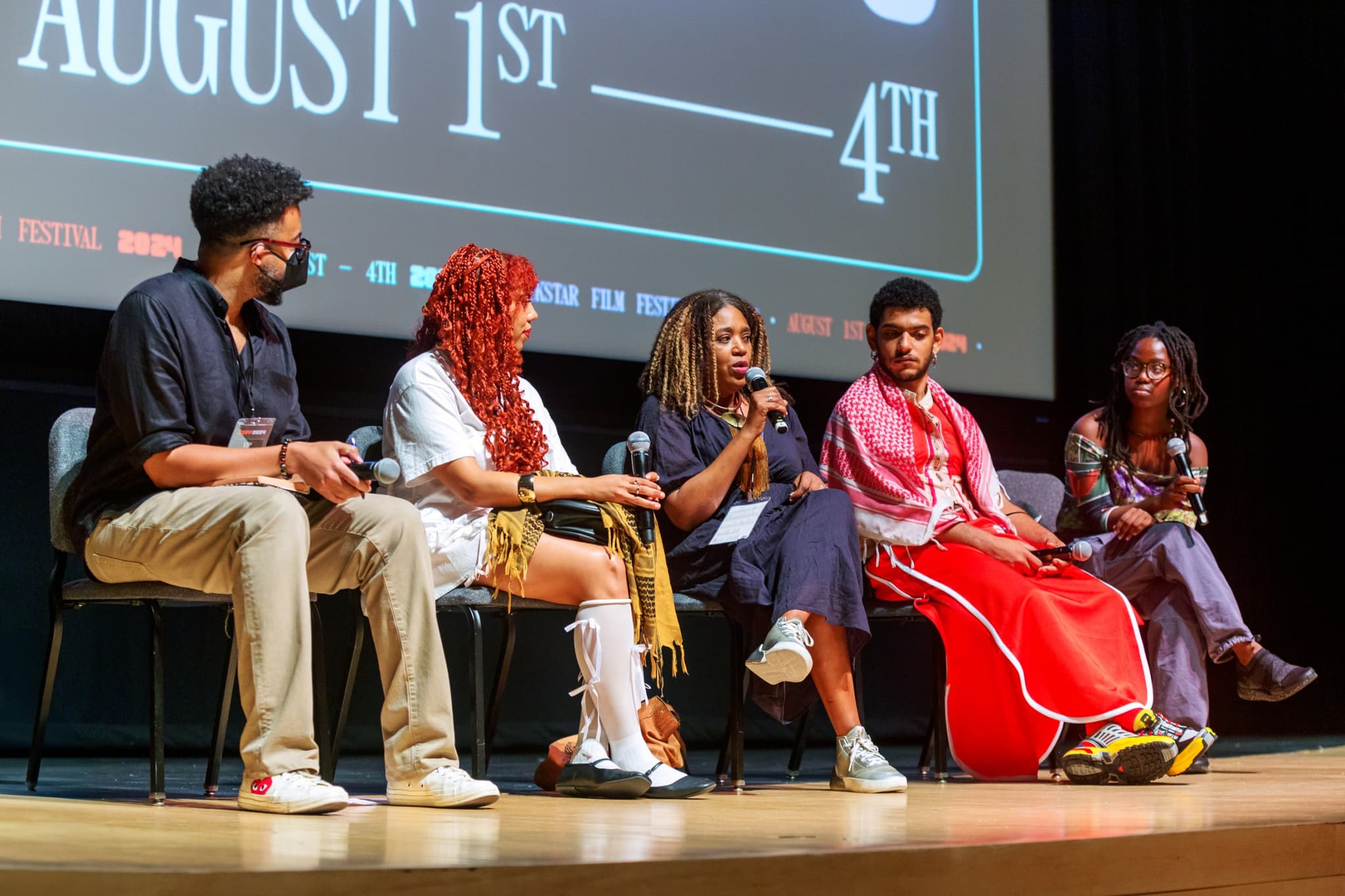 A panel speaks on stage at the 2024 BlackStar Film Festival